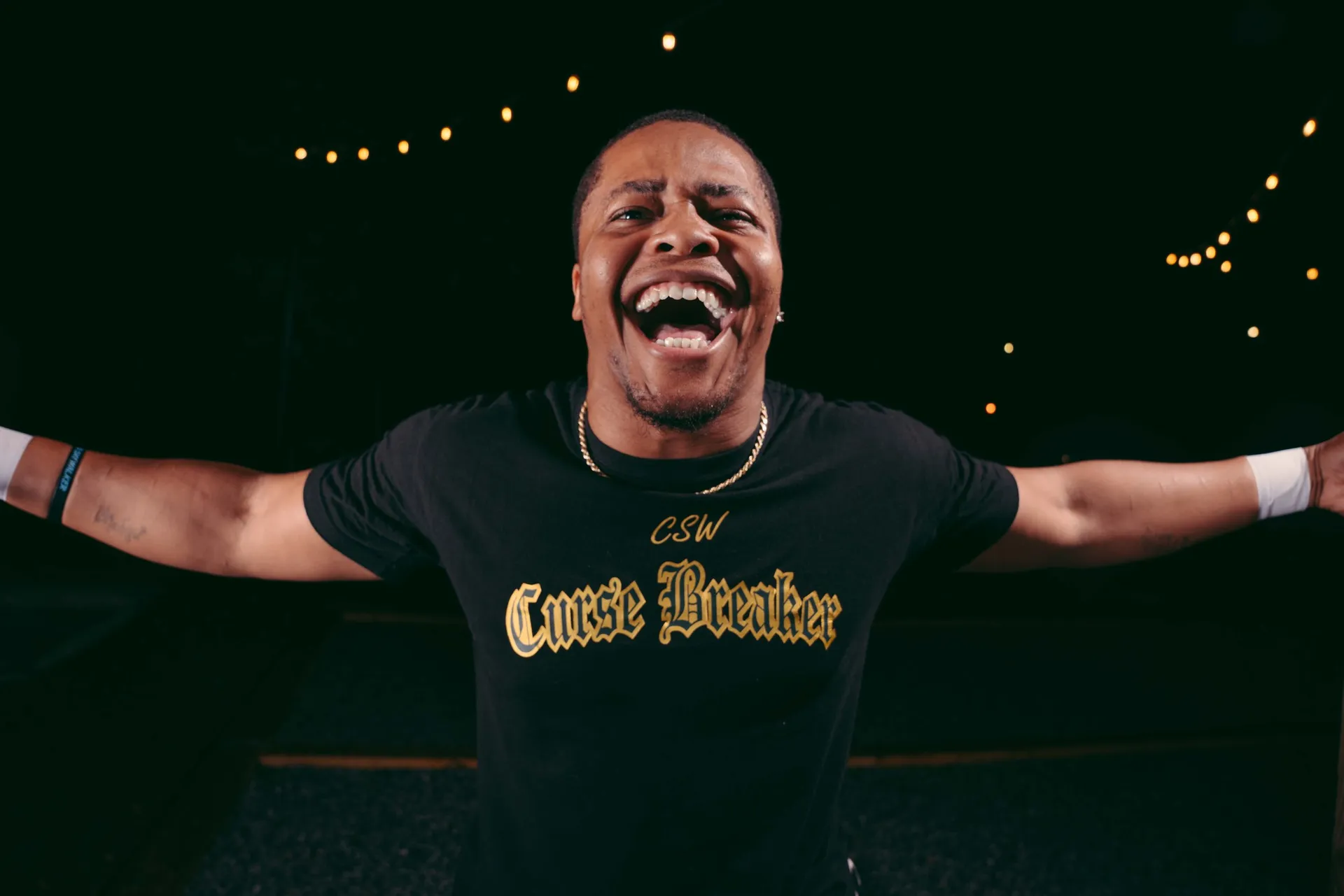 Deep South Wrestling performer smiling with arms outstretched