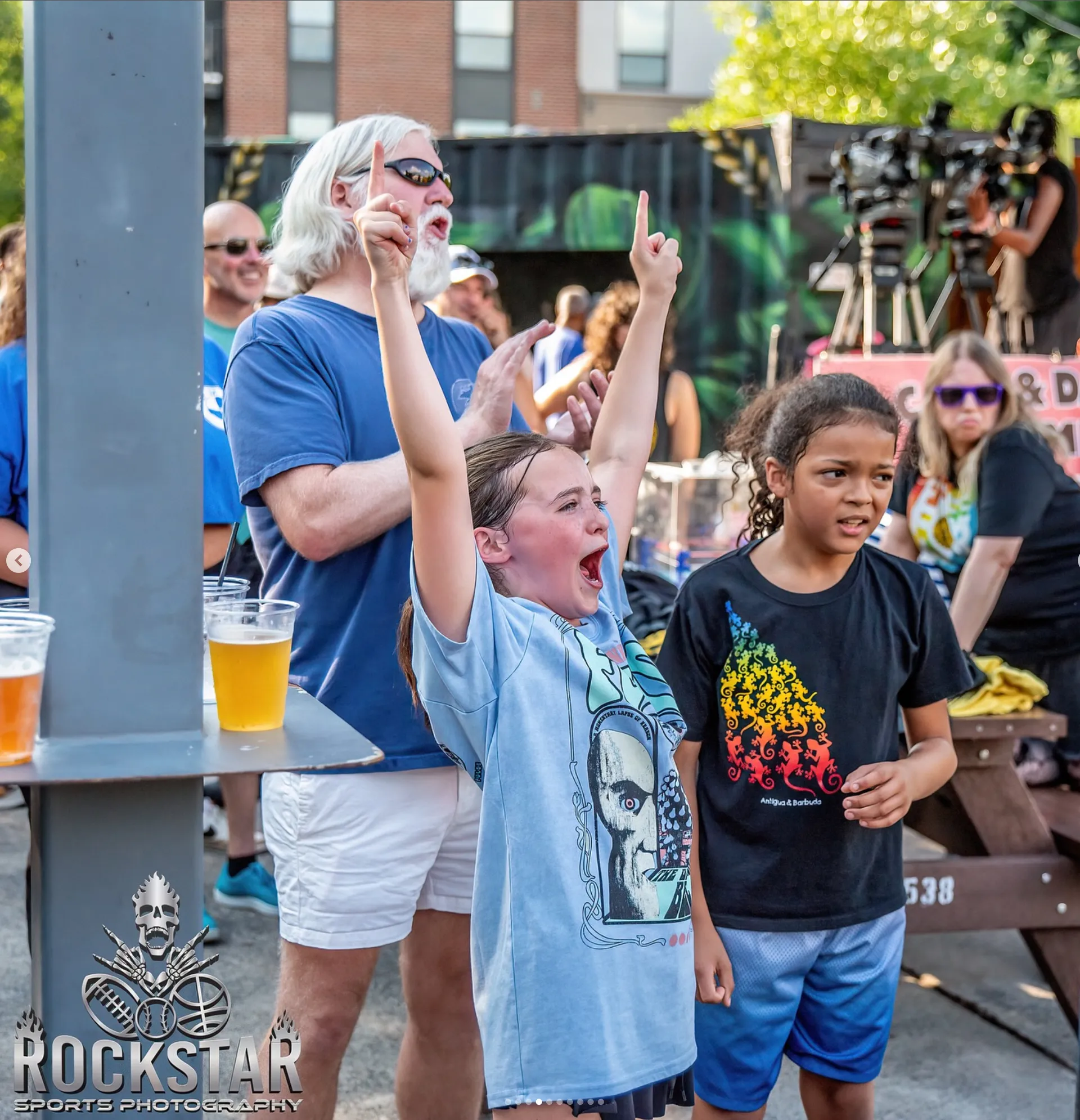 Kids cheering at a Deep South Wrestling show