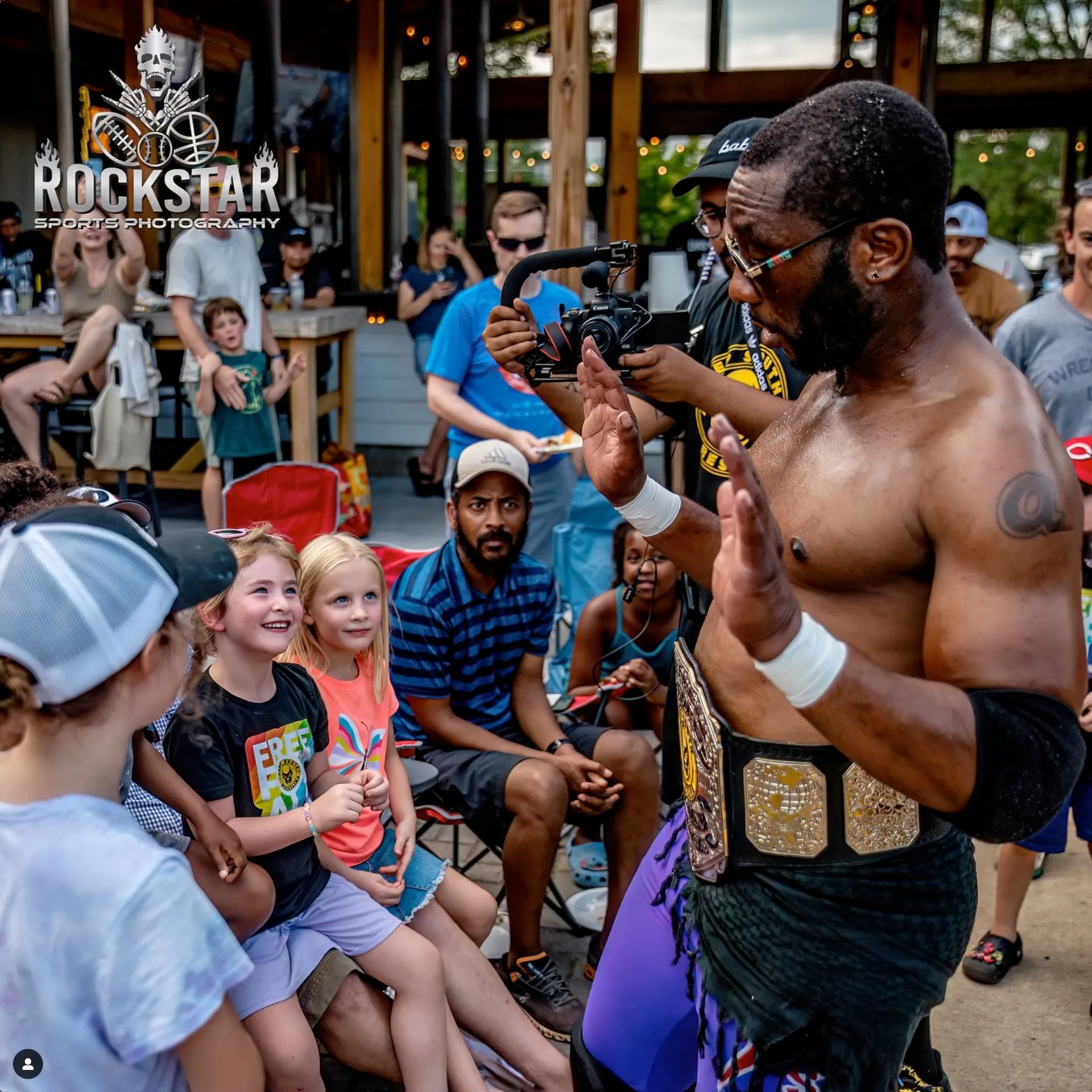 A wrestler connecting with young fans